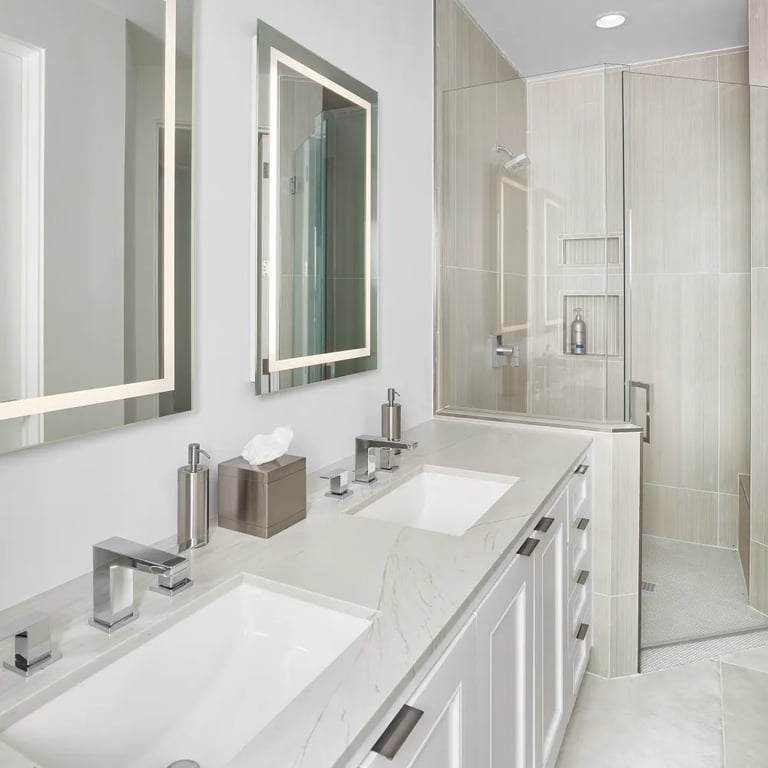 Mont Blanc Polished Quartzite (countertop), Reside Beige USA 24 x 48 (floor), Shibusa Bianco Straight Stack 1 x 24 (shower Walls) & Geo 2 Coin (showerpan)