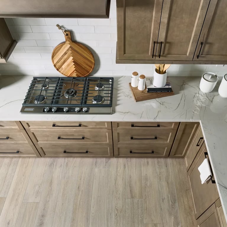 Mont Blanc Quartzite (counters), Spark White Matte 3 x 12 (backsplash) & BA-Almond 8 x 48 (floor)