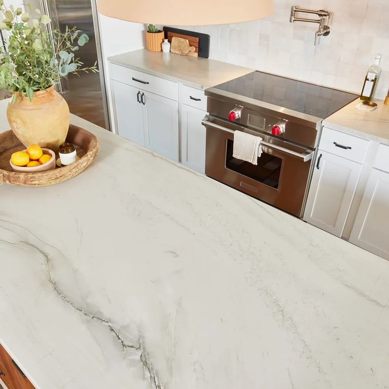 Mont Blanc Satin Quartzite on kitchen island and counters in kitchen.