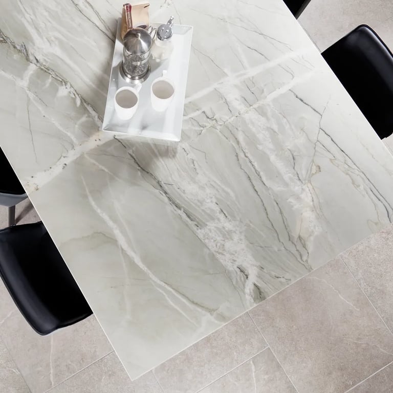 Nuage Quartzite on table & Futura Greige 24 x 48 porcelain tile on floor in conference room.