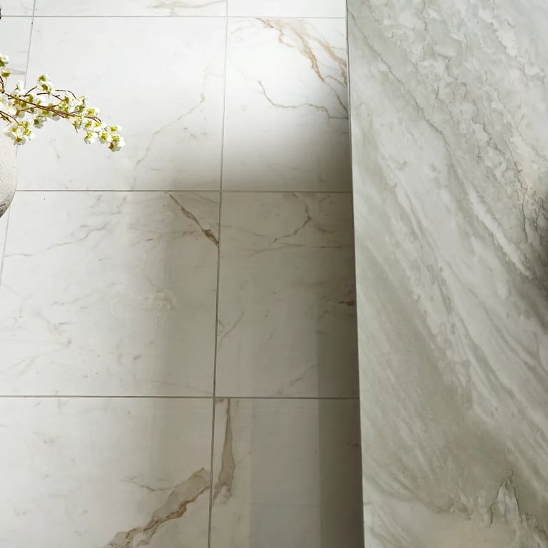 Polaris Quartzite (counter) & Marvel Calacatta Prestigio Polished 24 x 24 (floor)