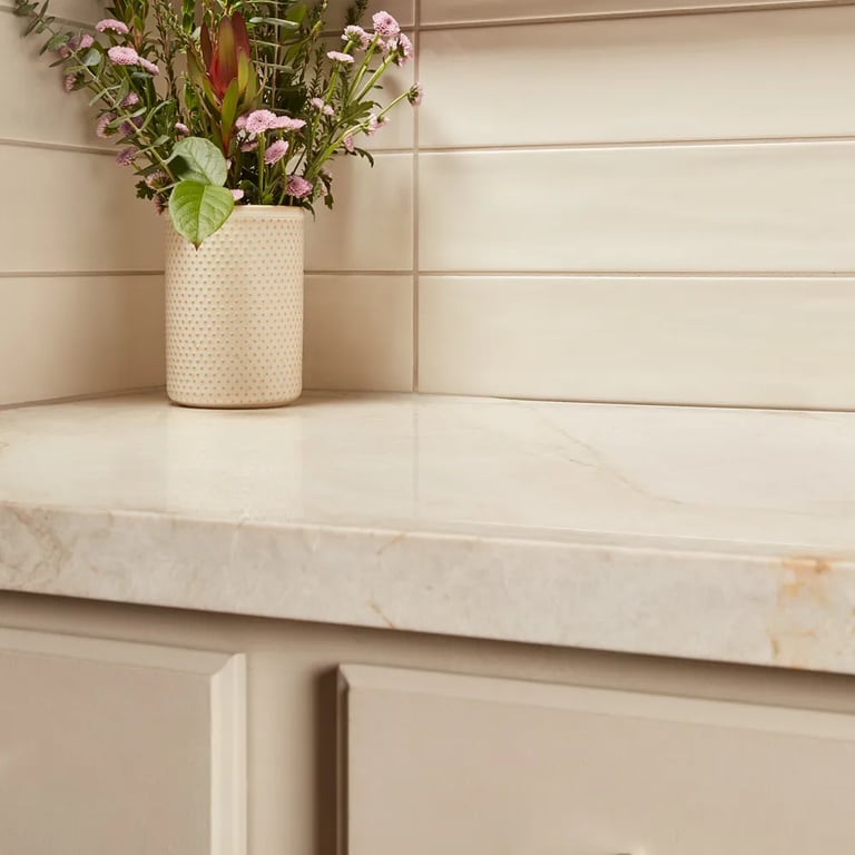 Taj Mahal Polished (countertop) & Gioia Bone 4 x 16 (backsplash)