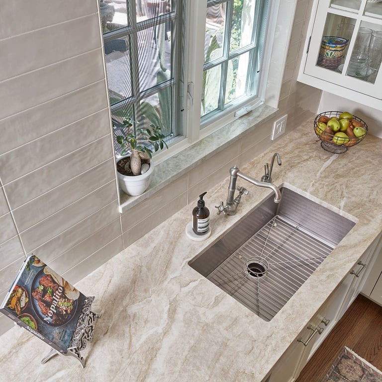 Taj Mahal Satin (counters) & Gioia Bone 4 x 16 (backsplash)