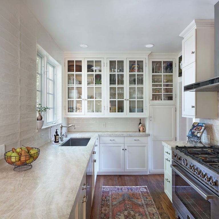 Taj Mahal Satin (counters) & Gioia Bone 4 x 16 (backsplash)