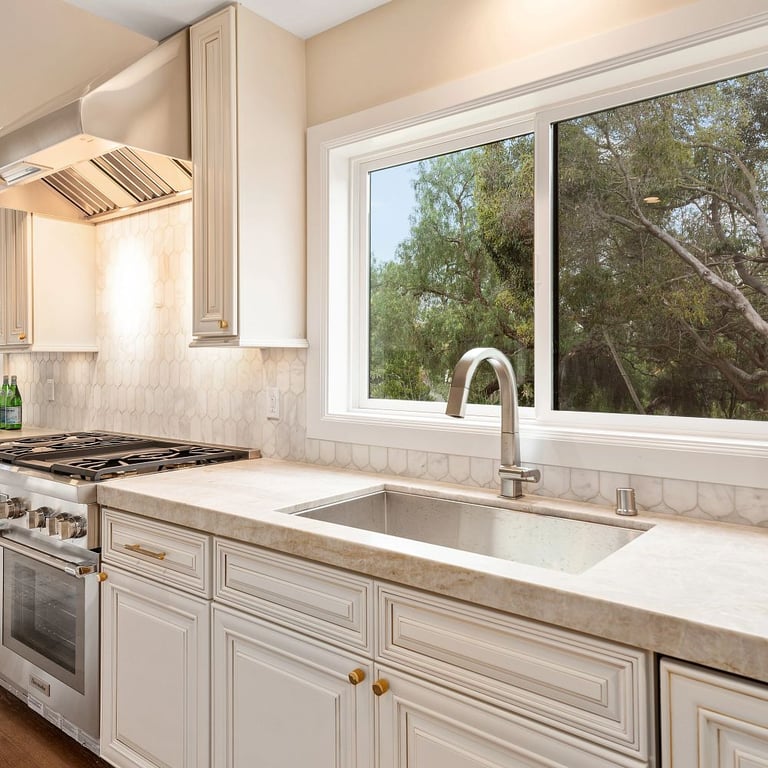 Taj Mahal Satin quartzite counters & CS-Calacatta Gris Honed Lotus marble mesh mount backsplash in kitchen
