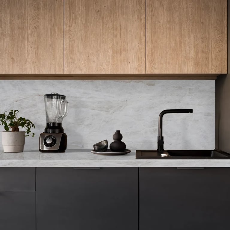 Taj Mahal Satin quartzite counter & backsplash in kitchen.