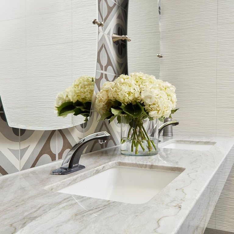 White Pearl Polished (counter), 3D Wave White Matte 12 x 22 (wall front), Cementine Retro 1 8 x 8 (wall left)