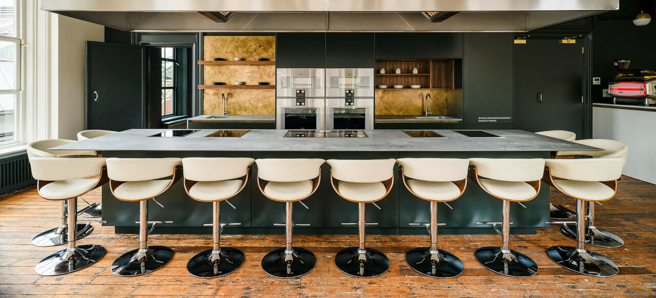 Industrial one-wall kitchen with island in Caesarstone 4033 Rugged Concrete