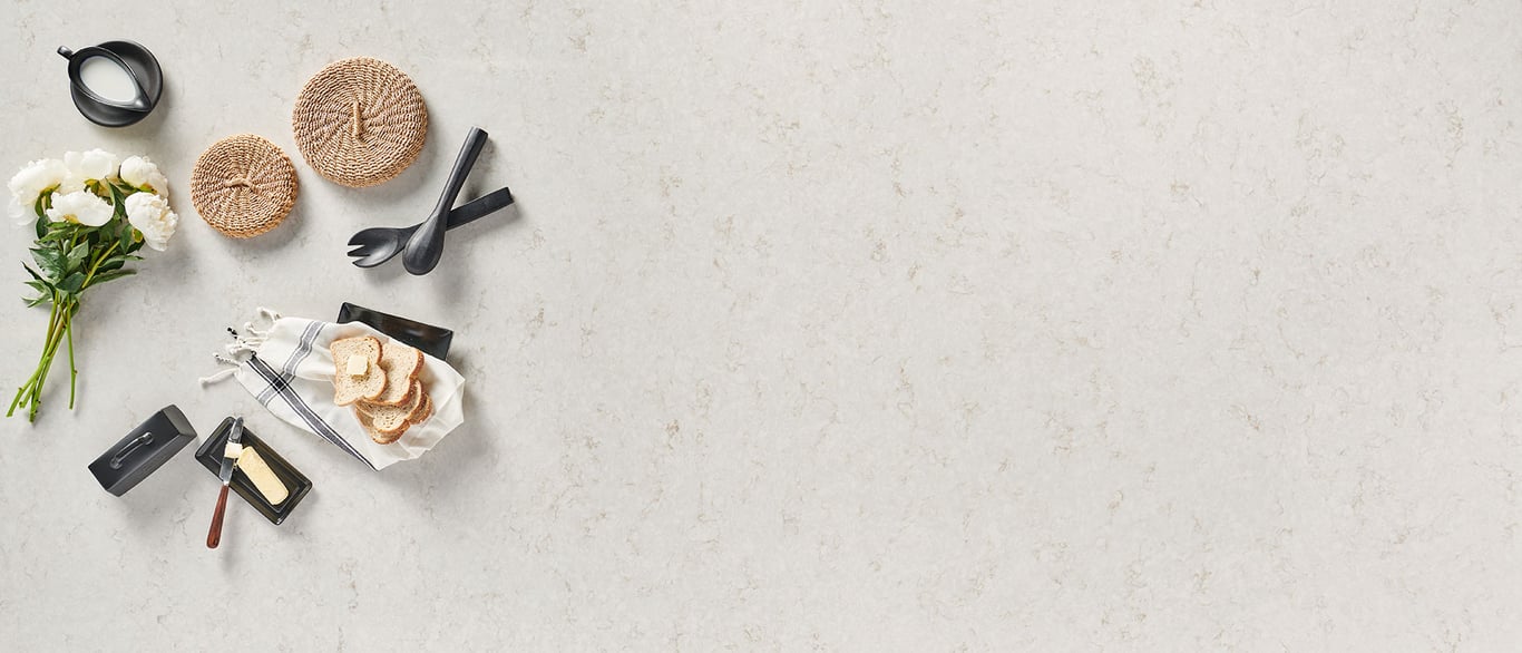 Cashmere Taj Quartz Countertop with a Decorative Vignette