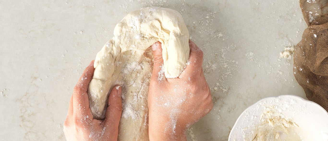 Cashmere Taj Quartz Countertop with a Culinary Vignette