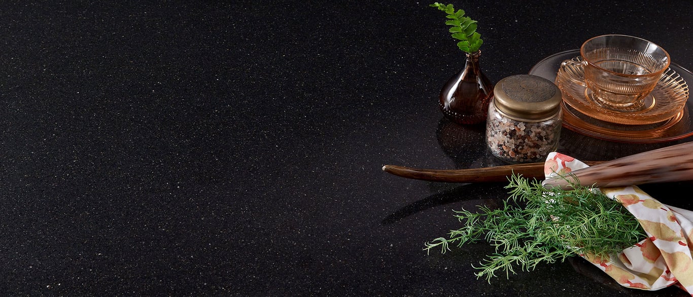 Midnight Majesty Quartz Countertop with a Decorative Vignette