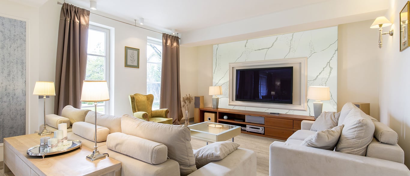 New Calacatta Laza Gold Quartz Slab as Accent Wall in Living Room