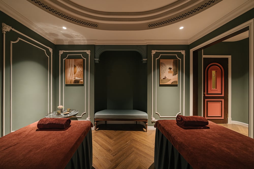 A private treatment room set for two