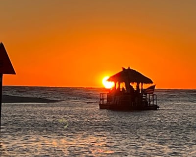 Cruise Bonita Springs on a Sunset Tiki Boat