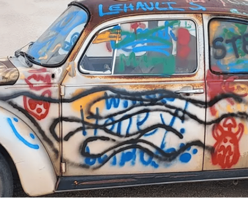 Graffiti Spray Painting on Vintage VWs in Kellogg