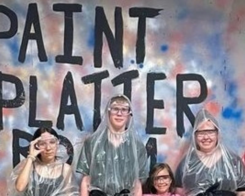 Paint Splatter Room with Black Light Neon in Broken Arrow