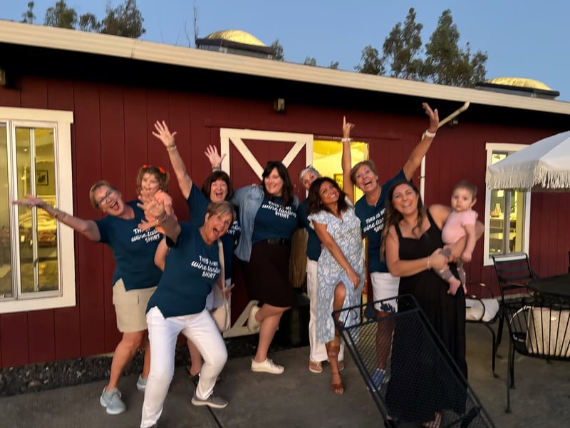 A group of guests at a wine tasting they booked together