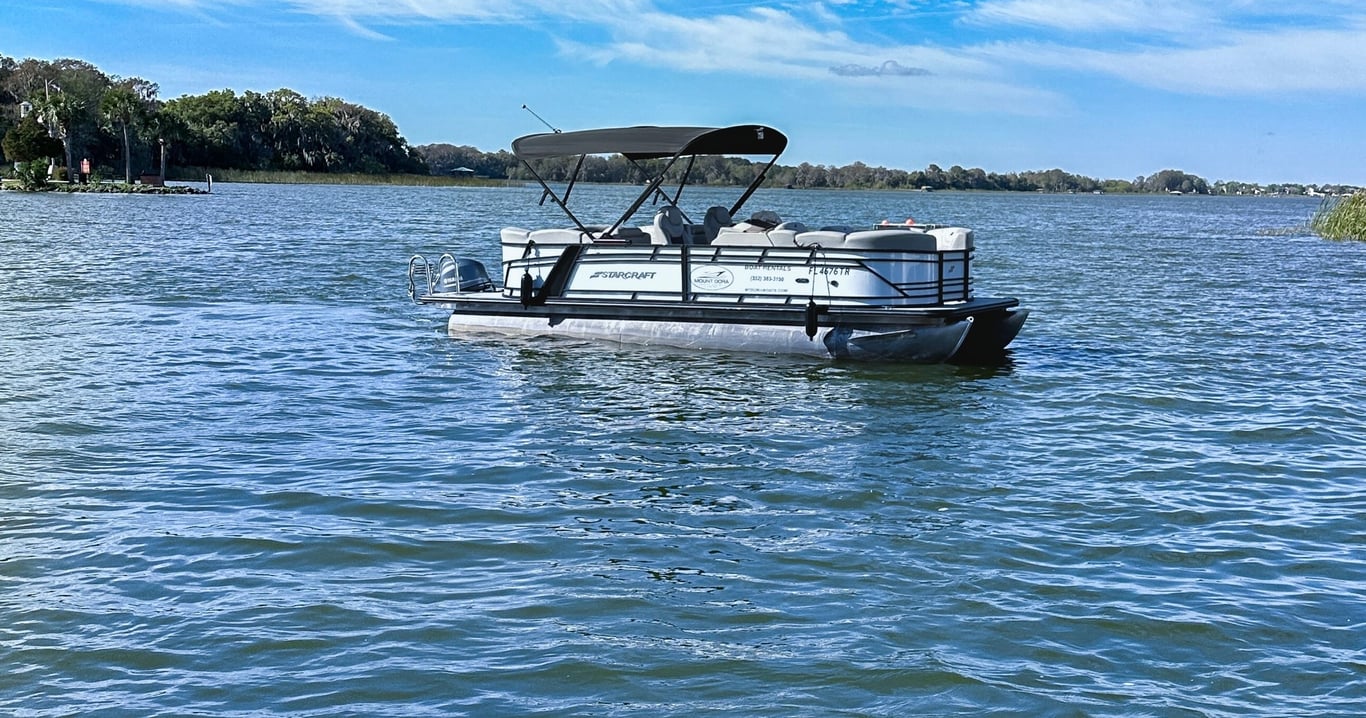 Cruise Harris Chain Lakes in 10 Person Pontoon