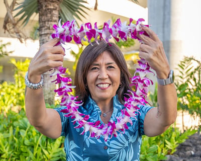 Receive an Orchid Lei Greeting at Kona Airport