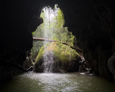 Charco Azul & Arenales Caves Guided Tour