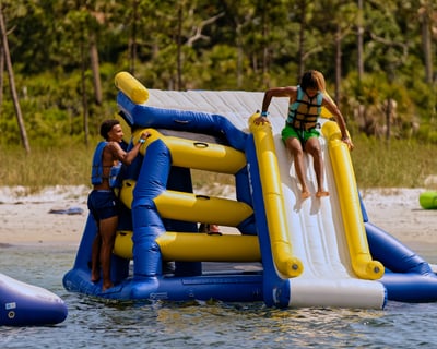 Cruise to Shell Island Inflatable Park & Dolphin Tour