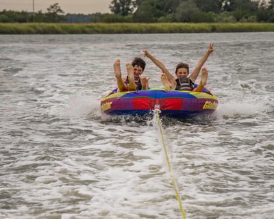 Private Boat Day with Skiing & Tubing for Families