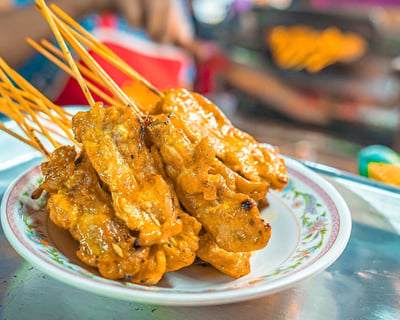 Explore Bangkok on an Evening Tuk Tuk Food Tour