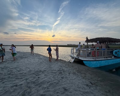 Cruise Folly River at Sunset on a Private Tiki Boat