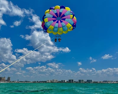 Parasailing in Destin Over Emerald Coast Waters
