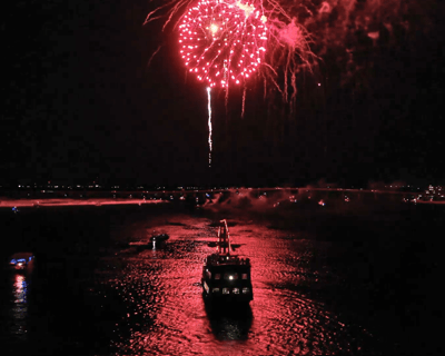 Watch HarborWalk Village Fireworks on a Destin Cruise