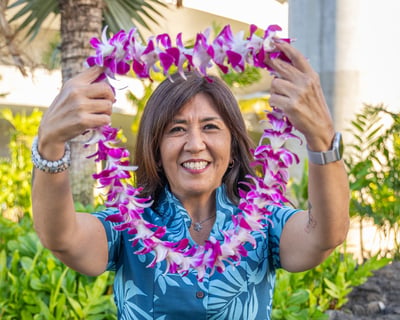 Receive a Classic Orchid Lei at Honolulu Airport