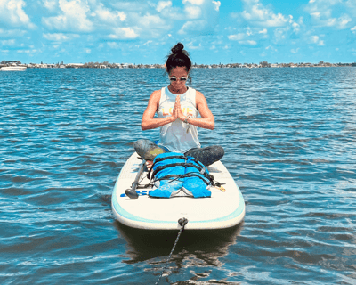 SUP Yoga Class on Holmes Beach Waters