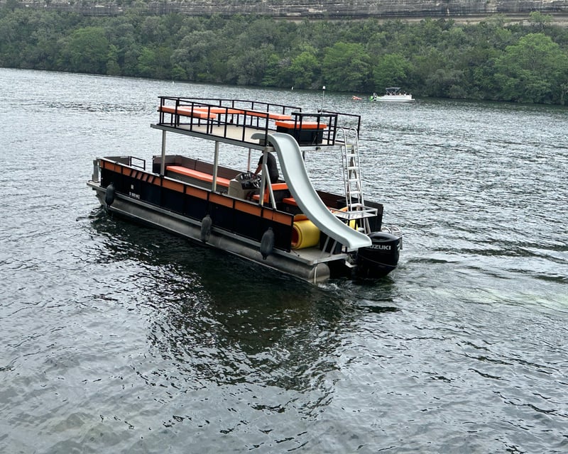 Double-Decker Party Boat with Water Slide on Lake Austin