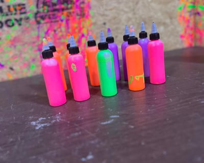 Neon Paint Splatter Experience in Welch
