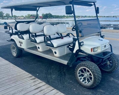 Cruise The Boardwalk In An 8-Seat Golf Cart Rental