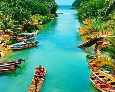 Blue Hole Swim & Bamboo Rafting Tour in Ocho Rios