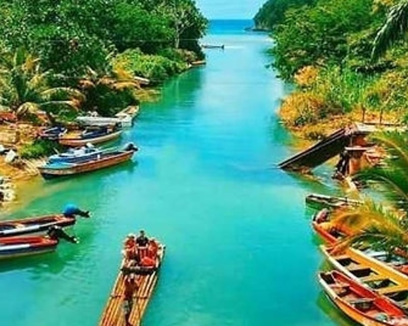 Blue Hole Swim & Bamboo Rafting Tour in Ocho Rios