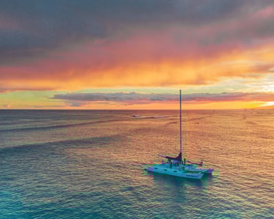 Watch Honolulu Skyline Glow on Sunset Sail