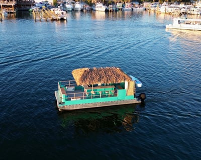 Cruise Destin Harbor on a Private Sunset Tiki Pontoon