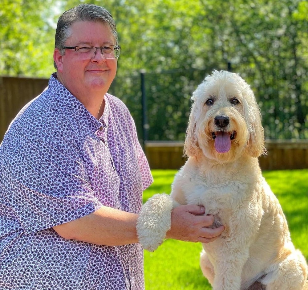 Brett Christoffel with his dog, Paisley