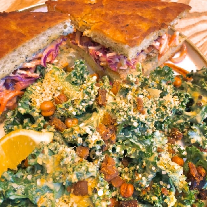 photo of Kind Cafe Buffalo Tofu Sandwich with side Kale Caesar Salad shared by @cosmicgalaxygirl on  02 Mar 2020 - review