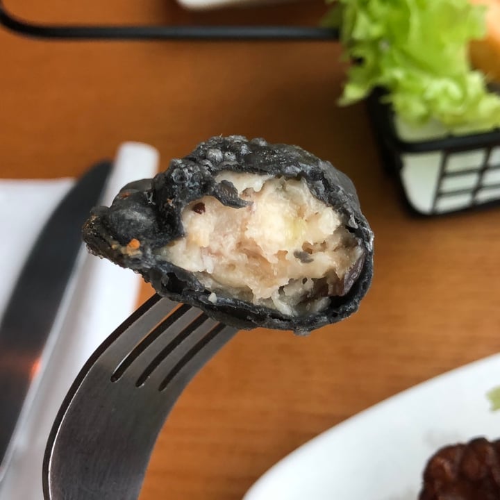 photo of nomVnom Bistro Charcoal Truffle Gyoza with Black Vinegar Ginger Dip shared by @ziggyradiobear on  25 Dec 2023 - review