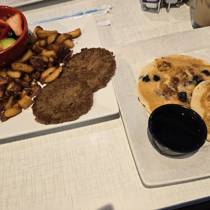 photo of Anna's House Vegan Pancakes (blueberries and bananas) with sides of vegan sausage and potatoes shared by @skyepie on  11 May 2025 - review