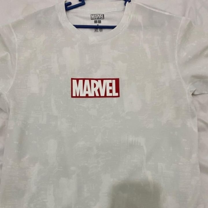 photo of Uniqlo Marvel logo t-shirt shared by @teamaldous on  25 Apr 2024 - review