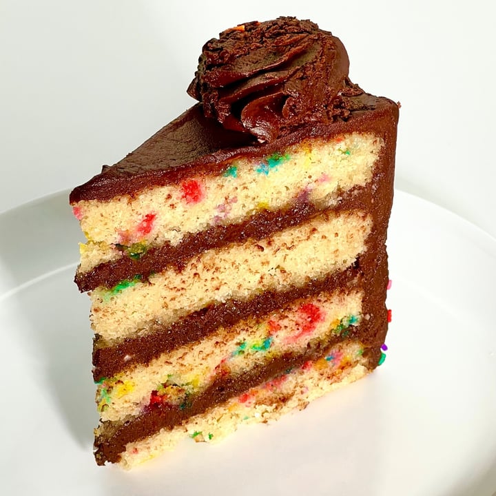 photo of Petunia's Pies & Pastries Chocolate Confetti Cake Slice shared by @pdxveg on  26 Sep 2023 - review