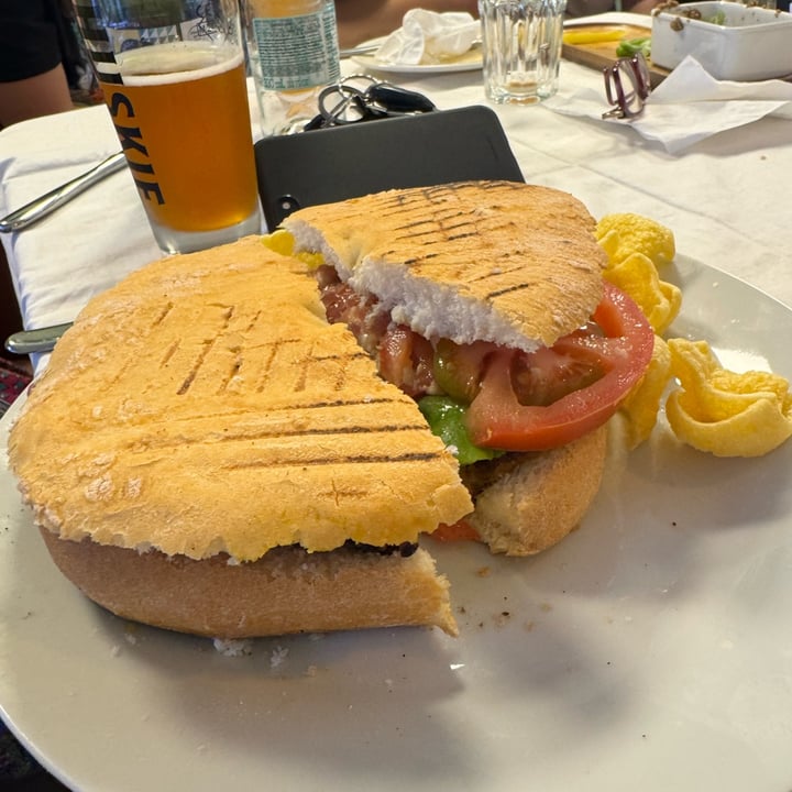photo of Nura Cafe & Salon Caramelised Onion And chickpea Ftira shared by @fitveganactivist on  29 Sep 2025 - review