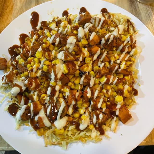 Photo of the dish “Vegan Salchipapa”
