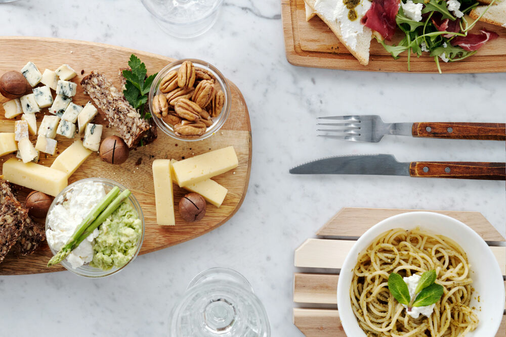 Different dishes with vegan cheese