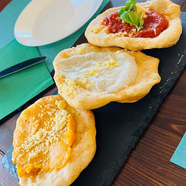 Photo of the dish “tris di montanara”