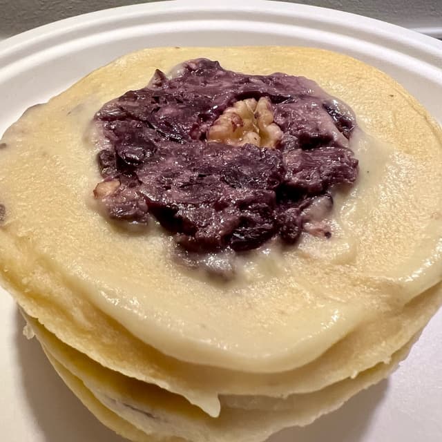 Photo of the dish “Torrette innamorate (crespelle di riso con radicchio e noci)”